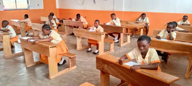 Pupils writing an examination
